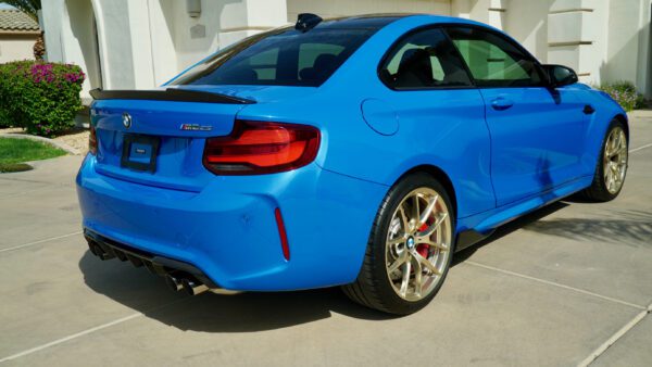 Back view of Metallic Blue BMW Car