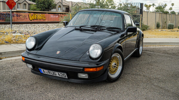 Black Porsche Vintage Car with headlights