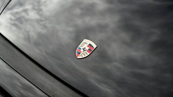Porsche Logo on Black Vintage Car