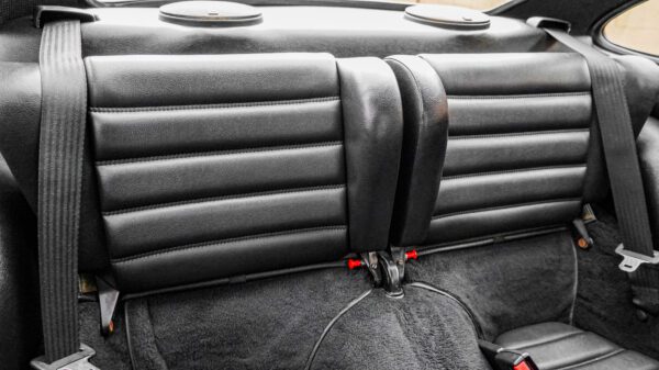 Slant nose car seats in black leather